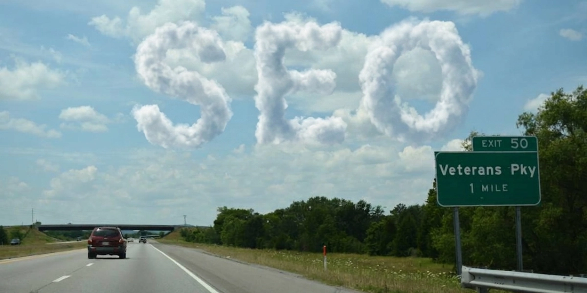 Veterans Pkway exit with an SEO cloud in the sky